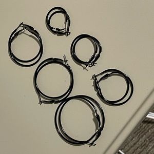 Six pairs multiple sizes Black hoop earrings